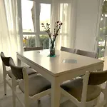 Stylish & Sunny Beach Apartment With Pool